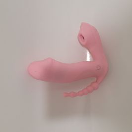 Pink vibrator with clitoral suction