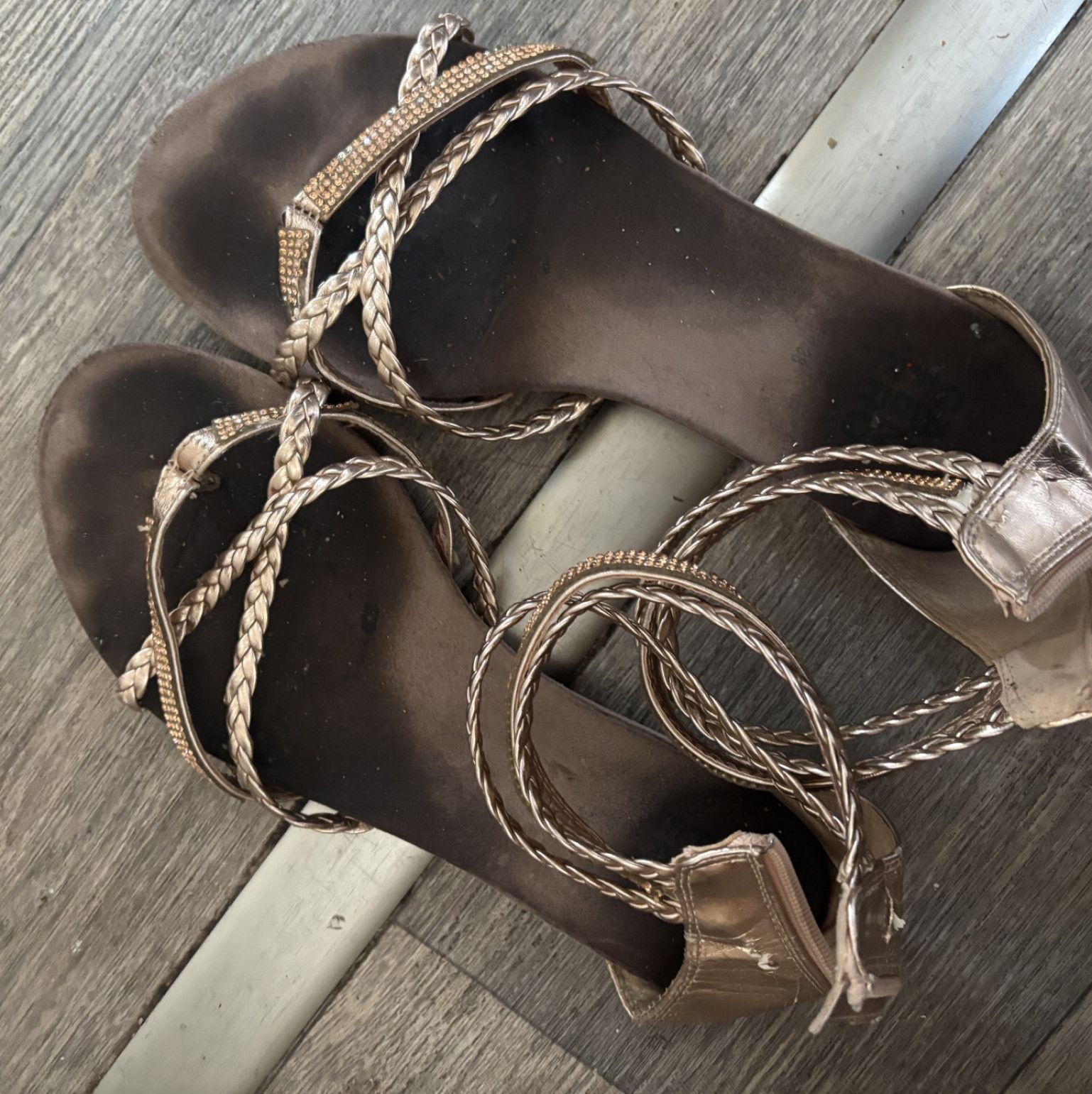 Extremely worn and smelly sandals