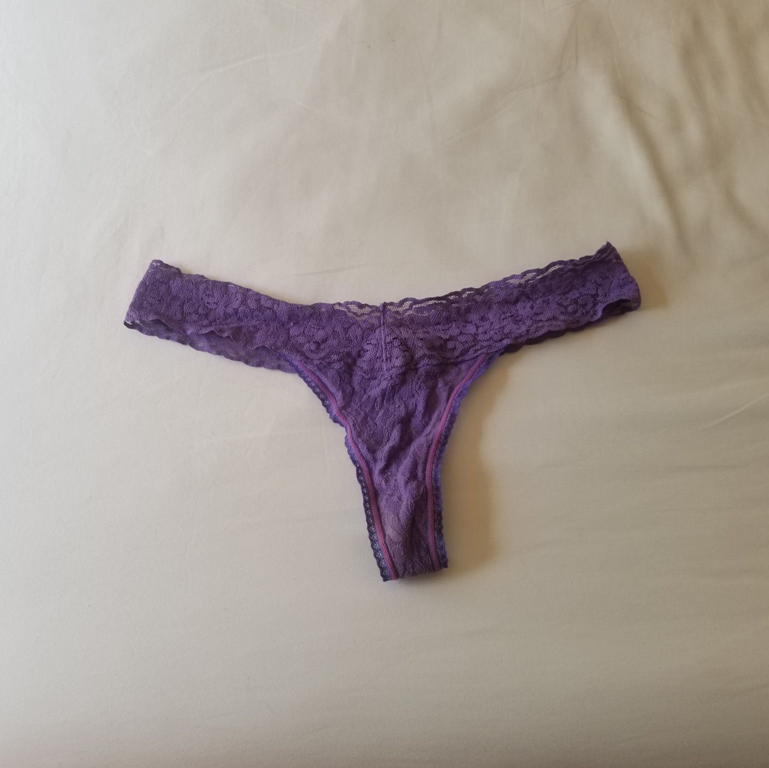 Bright purple lace thong