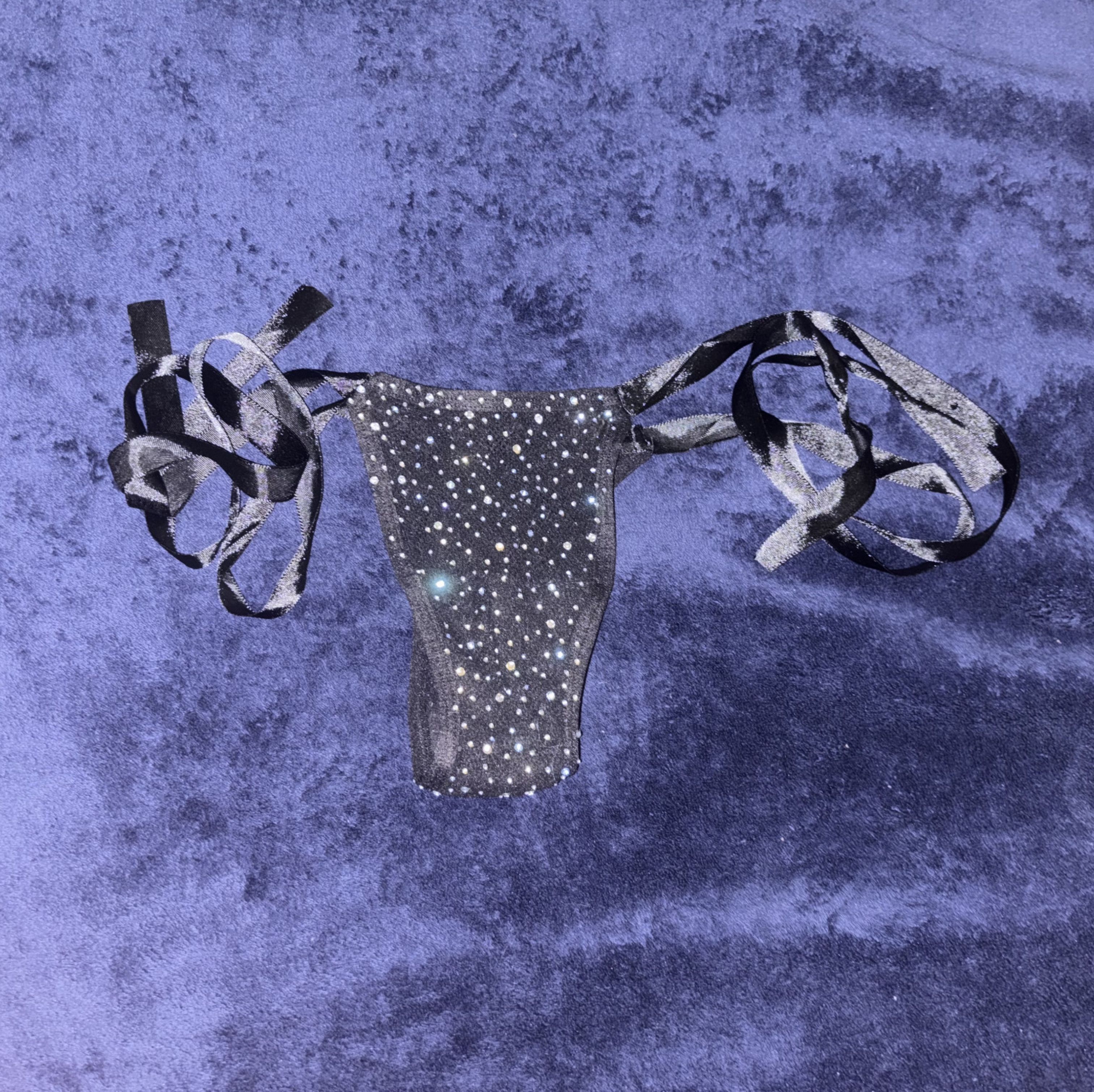 Side tie sparkly black thong