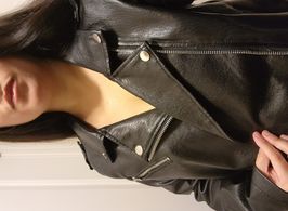 Guess whats under my leather jacket