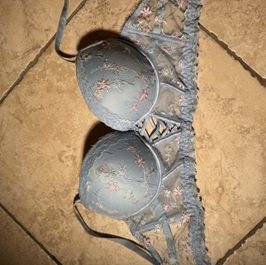 Delicate blue bra with a pattern of flowers with a pushup