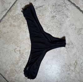 Black thong panties with a transparent nylon back