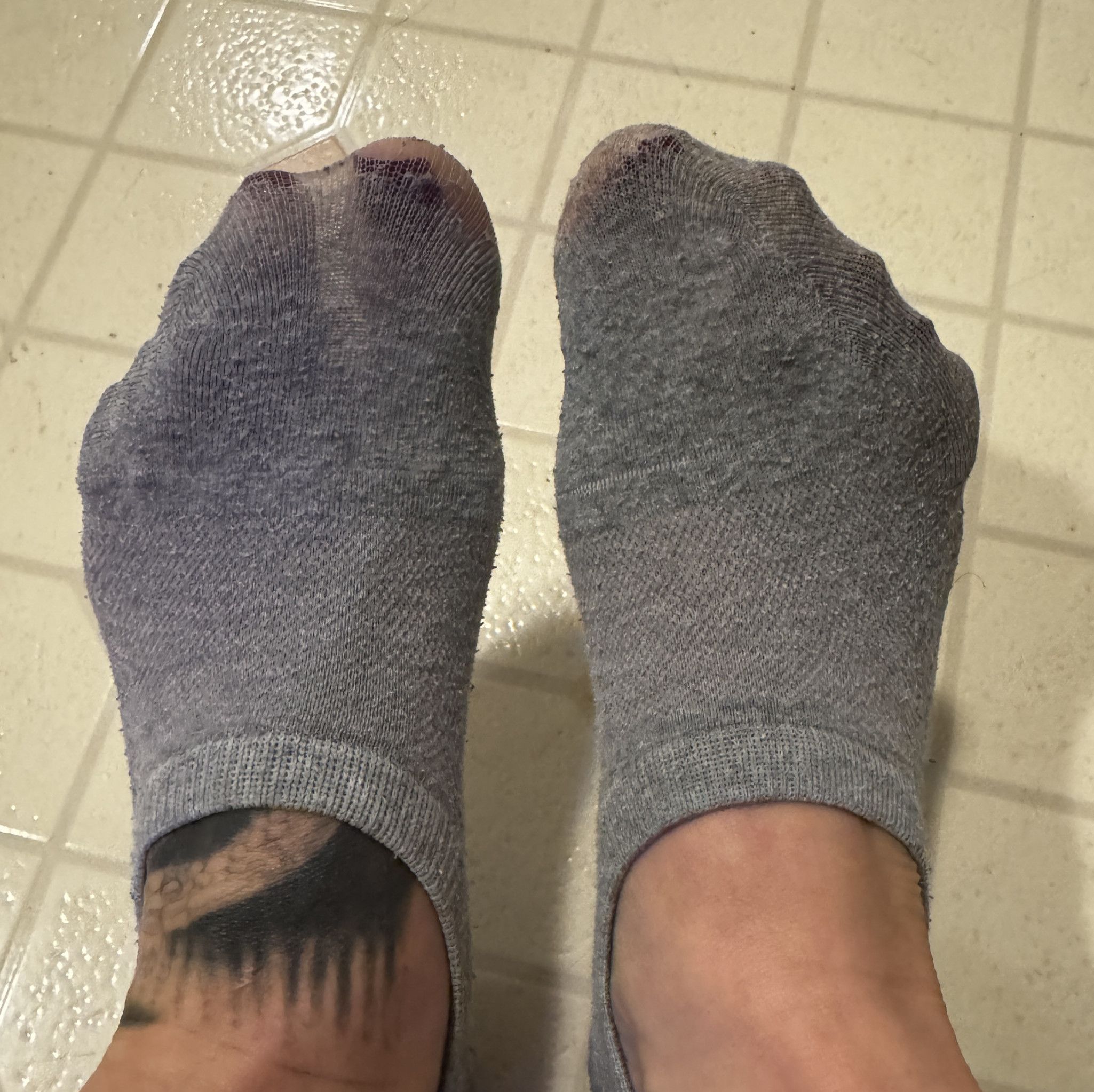 Old well worn ankle socks