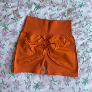 orange butt scrunch workout shorts