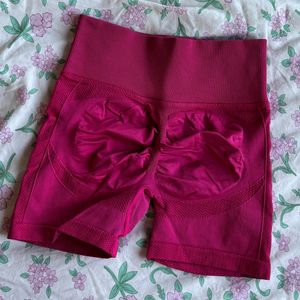 bright pink butt scrunch workout shorts
