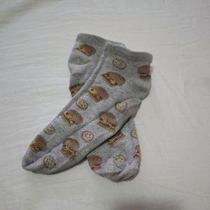 Socks with burger and pickle pattern