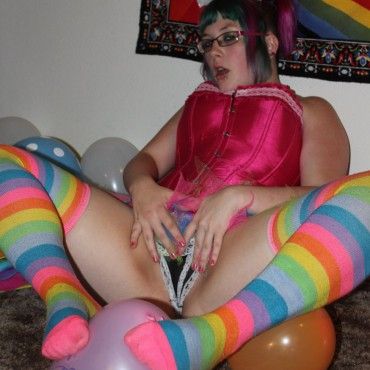 girl playing with Baloons