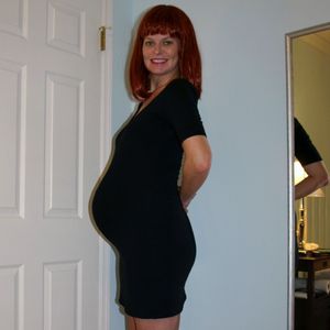 Photos: 40 Pregnant Strip and posing 2011 black dress