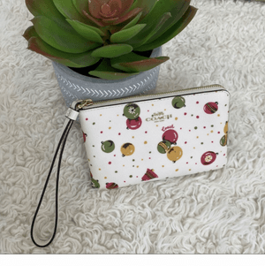 NWT Coach Corner Zip Wristlet With Ornament Print