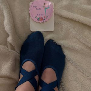 blue used yoga socks