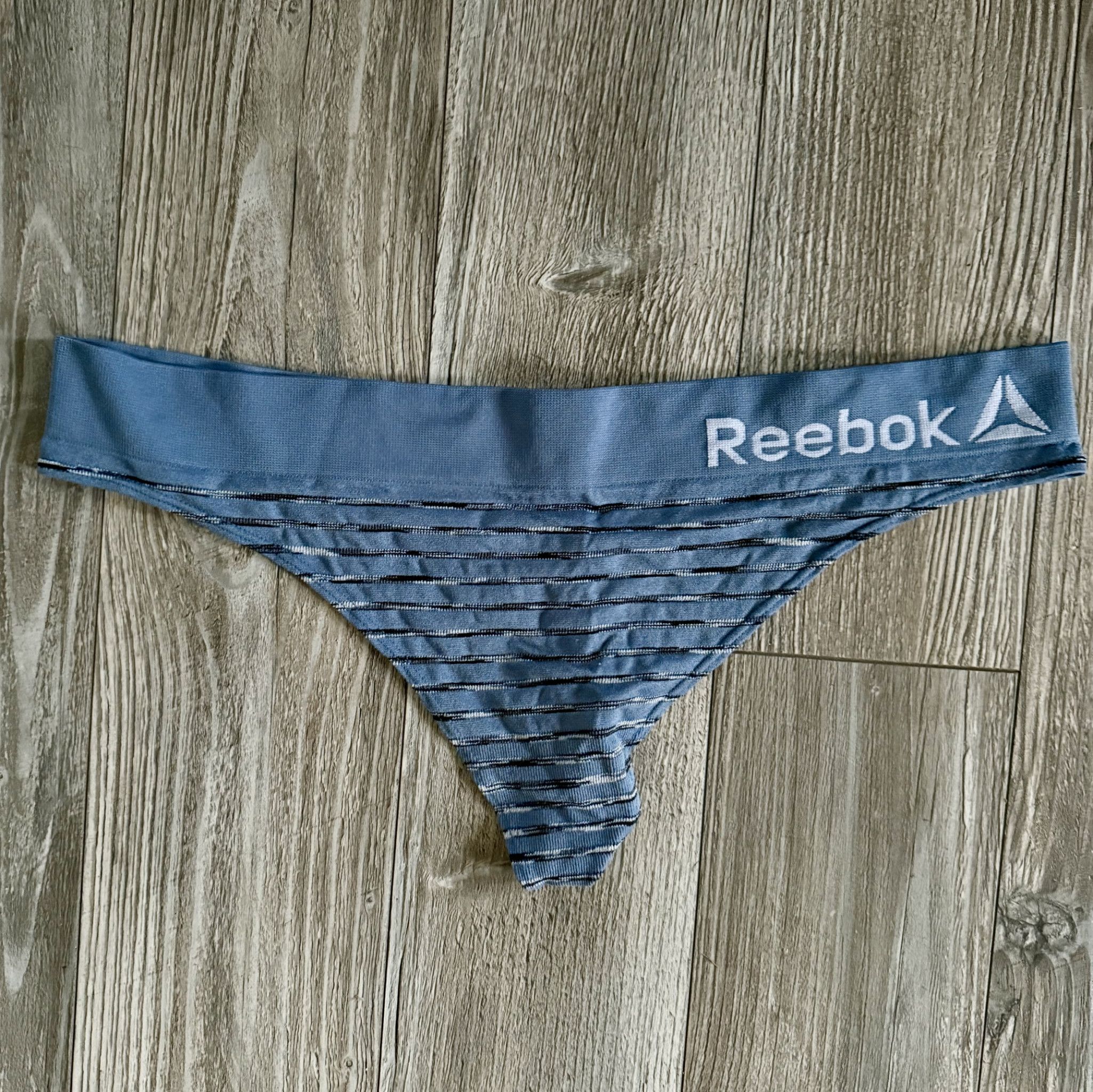Reebok thong
