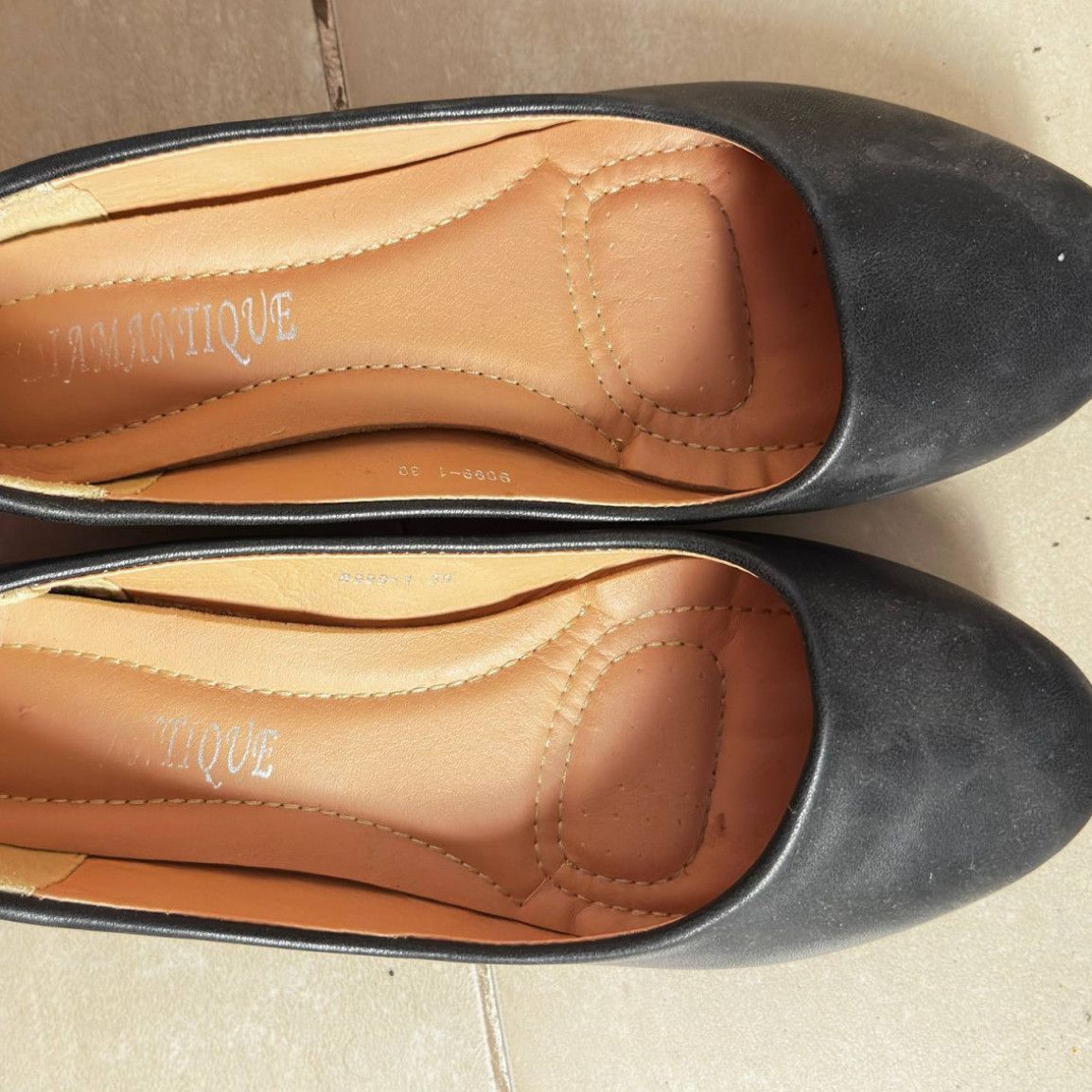 Worn Black Ballet Flats