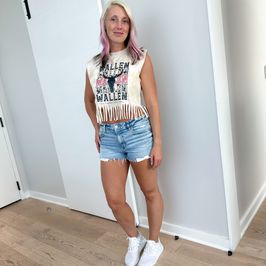 Jean shorts and white sneakers