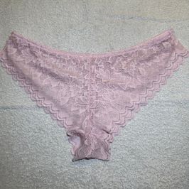 Pink lace thong worn with scent
