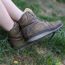 Heavily worn brown leather orthopaedic shoes