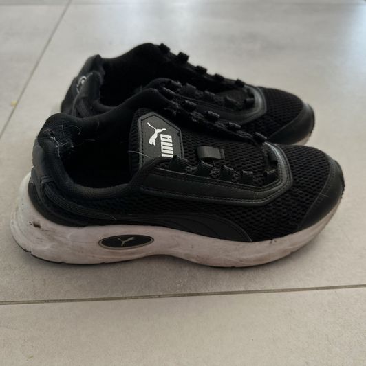 Worn and smelly Puma sneakers