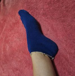 Worn blue ankle socks