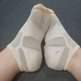 Mailed Very Old White Socks With Holes And Staines Soles