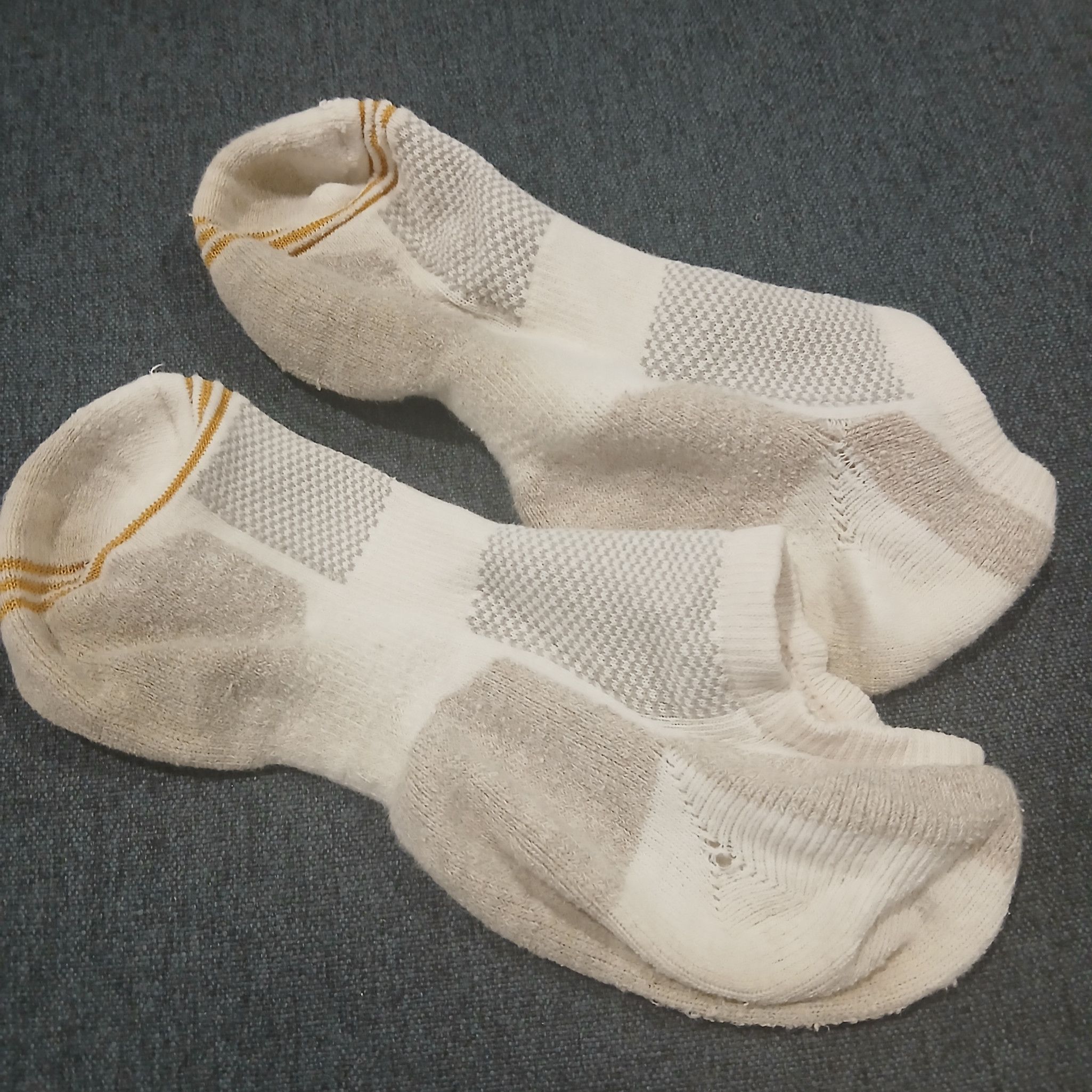 Mailed Very Old White Socks With Holes And Staines Soles