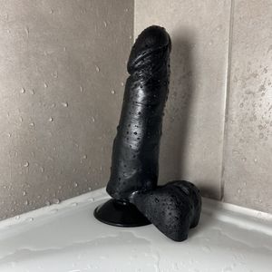 Used large black dildo