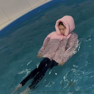 Down jacket from pool video