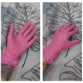 Pink medical vinyl gloves