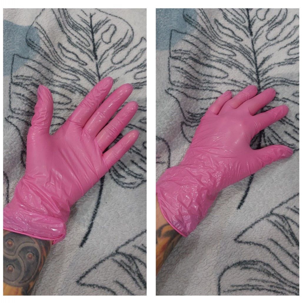 Pink medical vinyl gloves