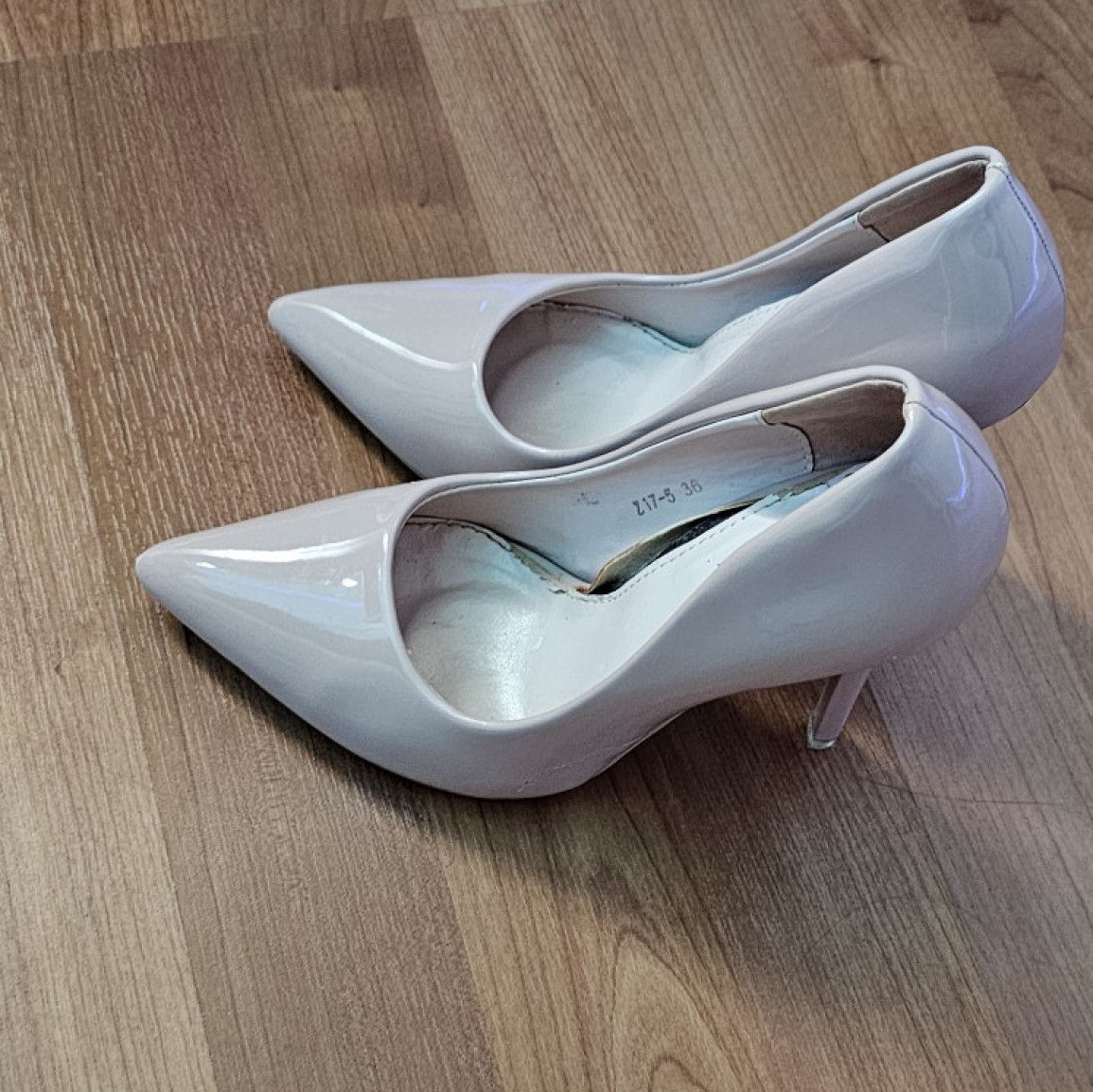 Destroyed stilletos by my feet