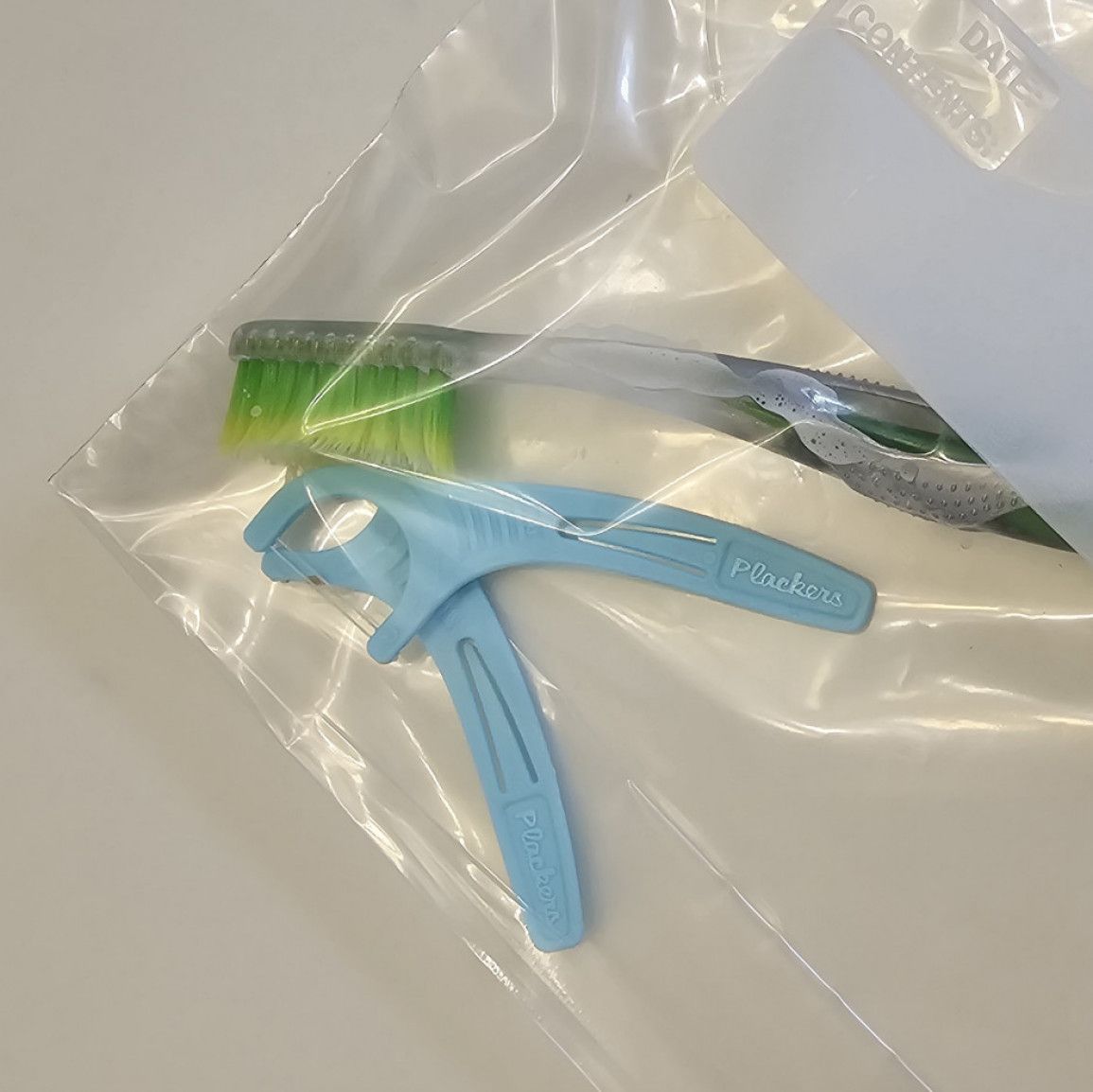 Toothbrush and floss