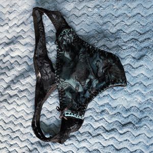 Black and green thong
