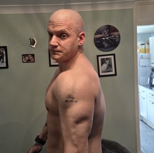 Signed photo side triceps pose