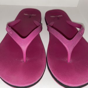 Well worn Calvin Klein Flip Flops
