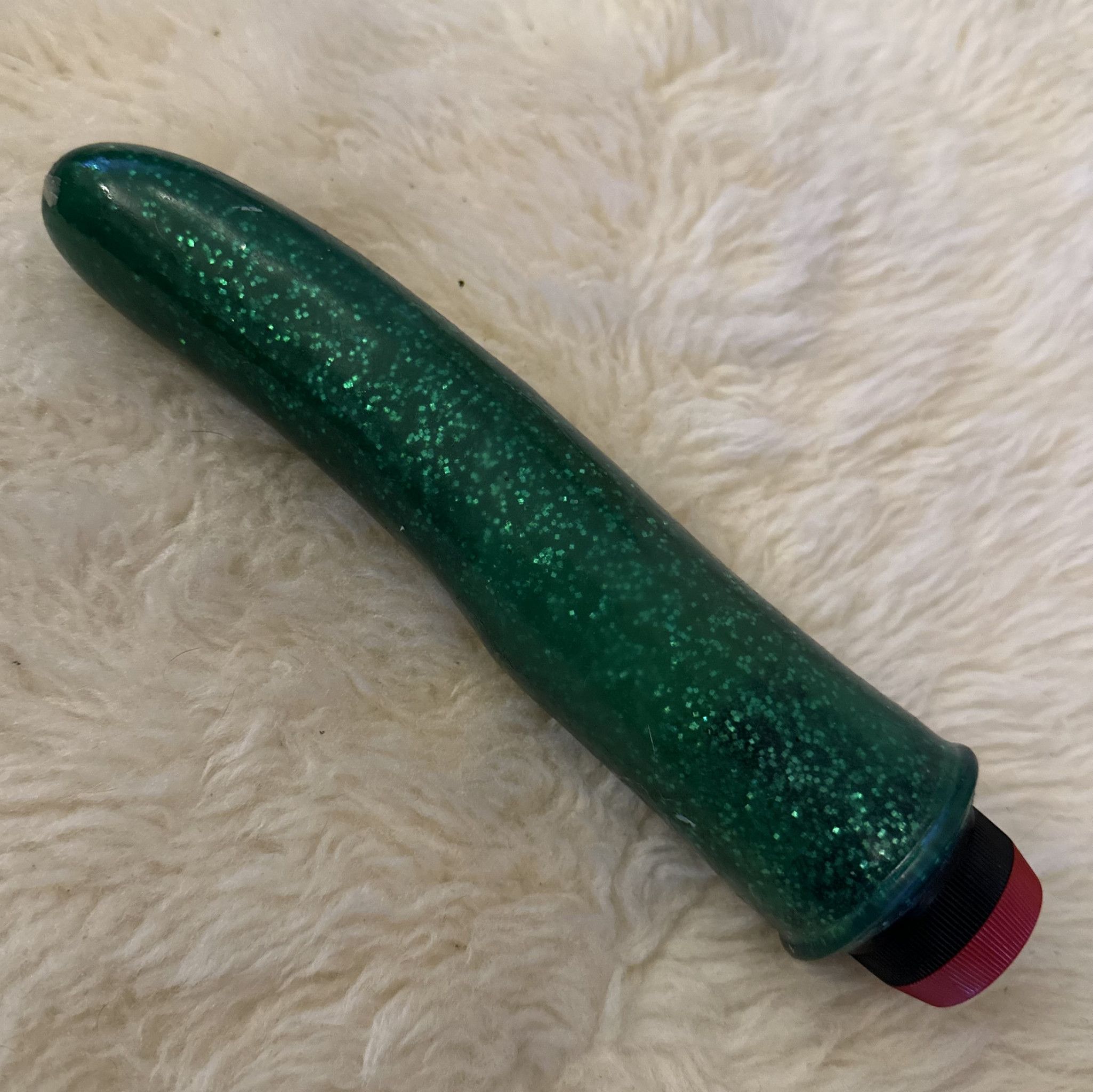 Solid green glitter dildo