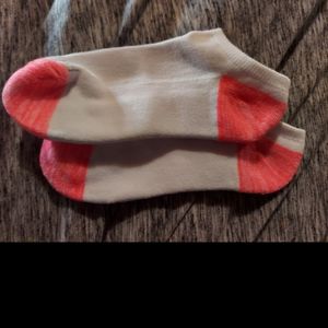 Neon orange and white no show socks