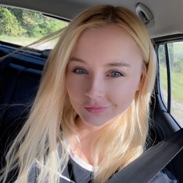 Some photos of Anna in the car and in the forest