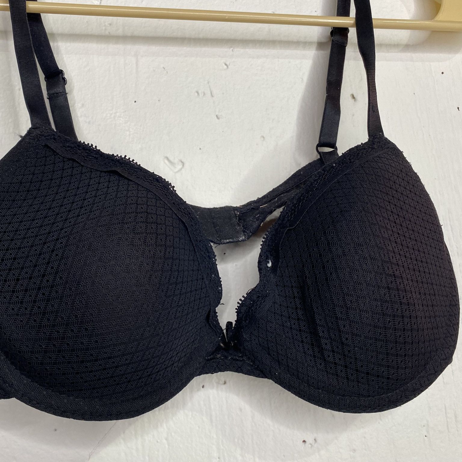 Well worn black bra