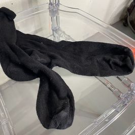 Black well worn socks