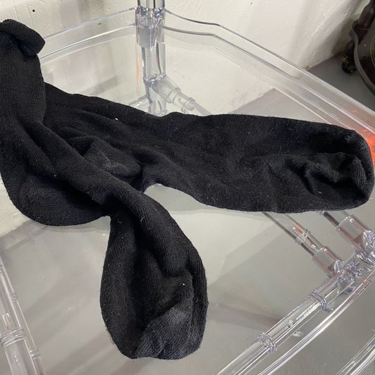 Black well worn socks