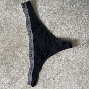Black Calvin Klein thong worn by Goddess Luna Law