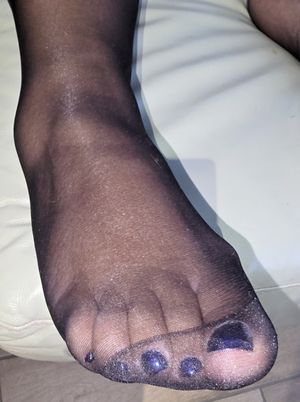 Feet in Shimmery Stockings
