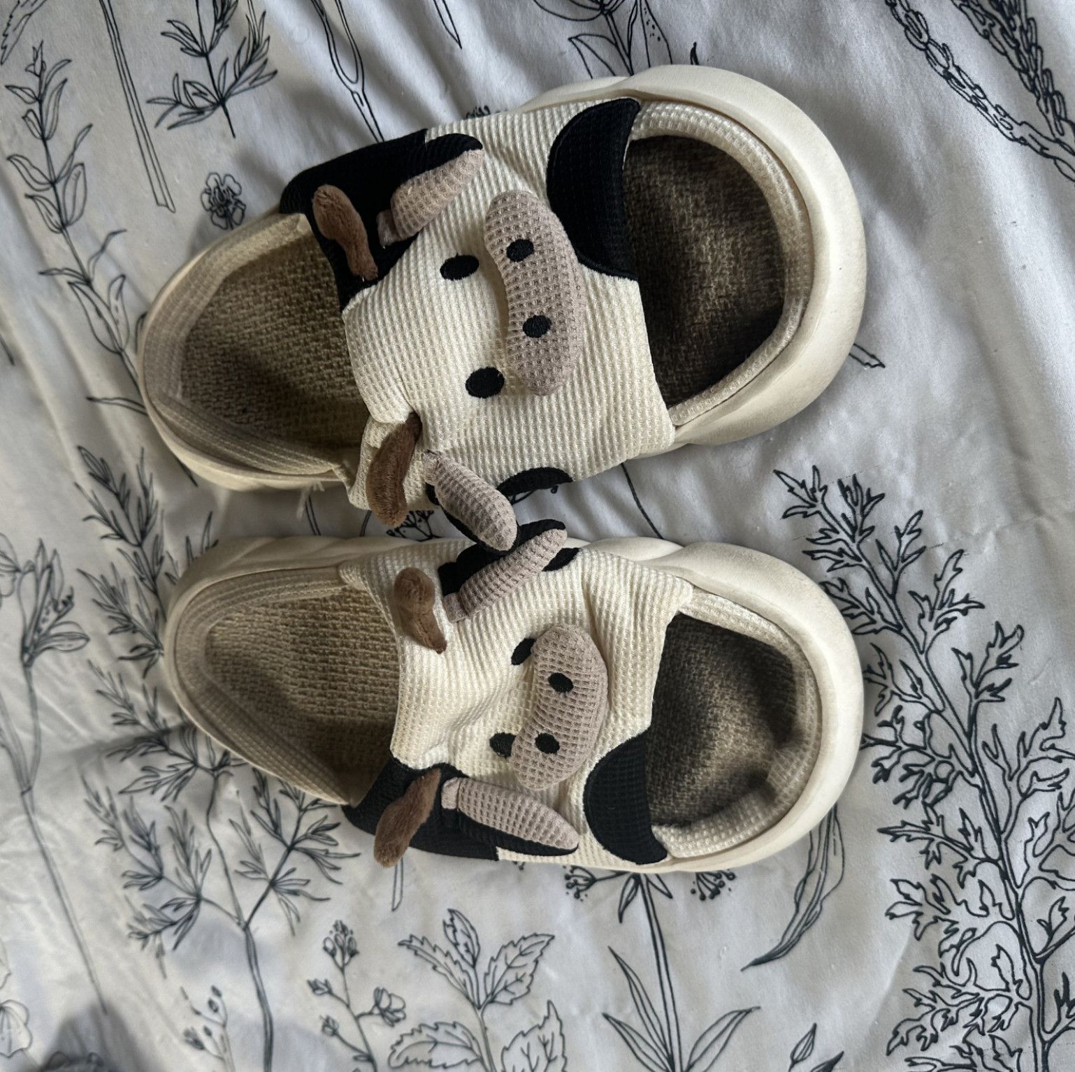 Worn Cow House Slippers
