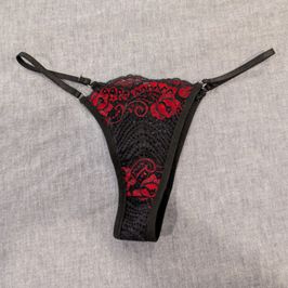 Red and black thong worn multiple times