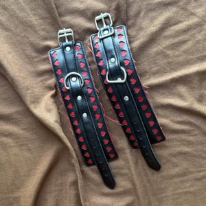 Black and red handcuffs with hearts