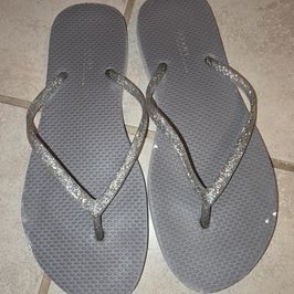 Worn old navy flip flops
