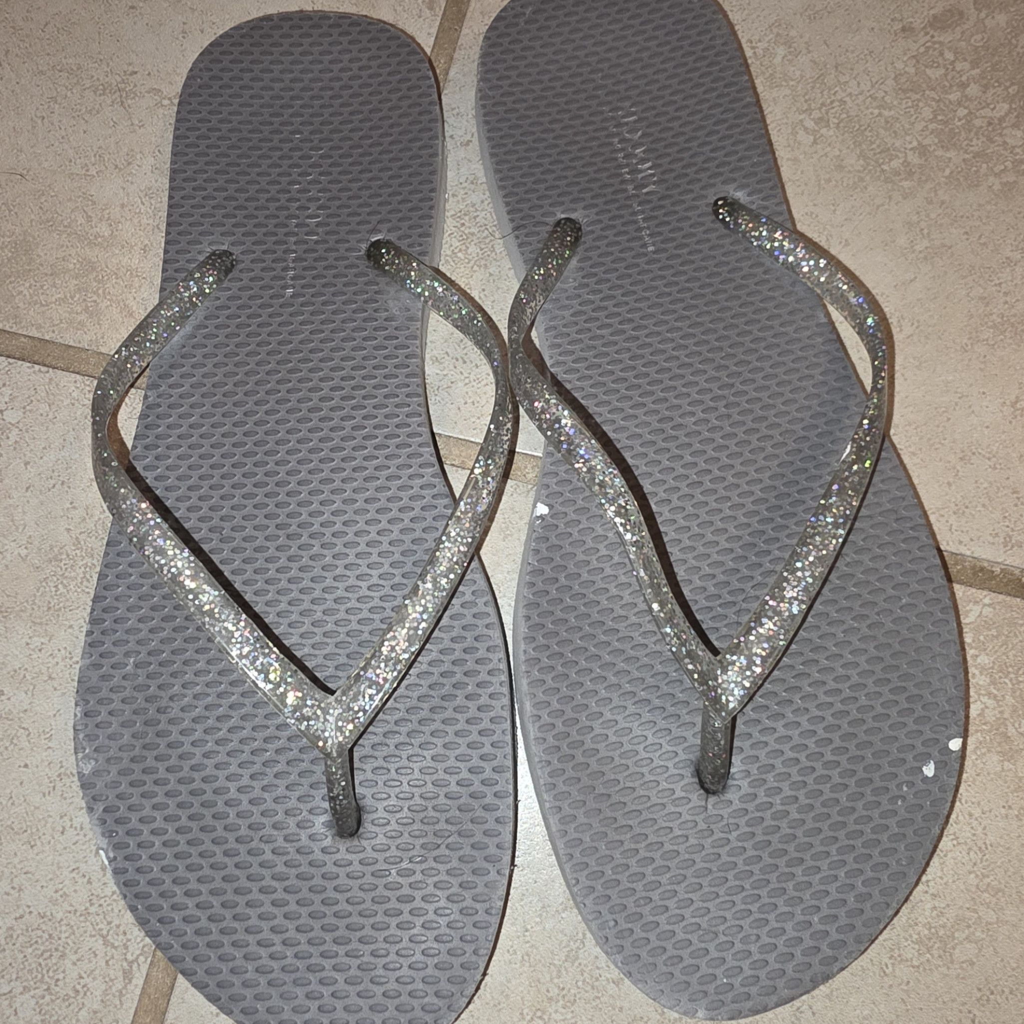 Worn old navy flip flops