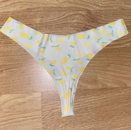 Worn lemon thongs