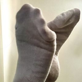 White Ankle Socks Worn and Waiting to be Claimed
