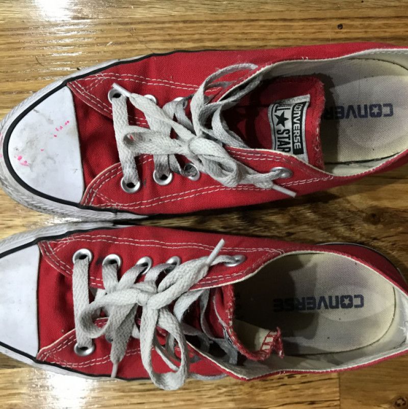 Well Worn Red Converse Low Tops