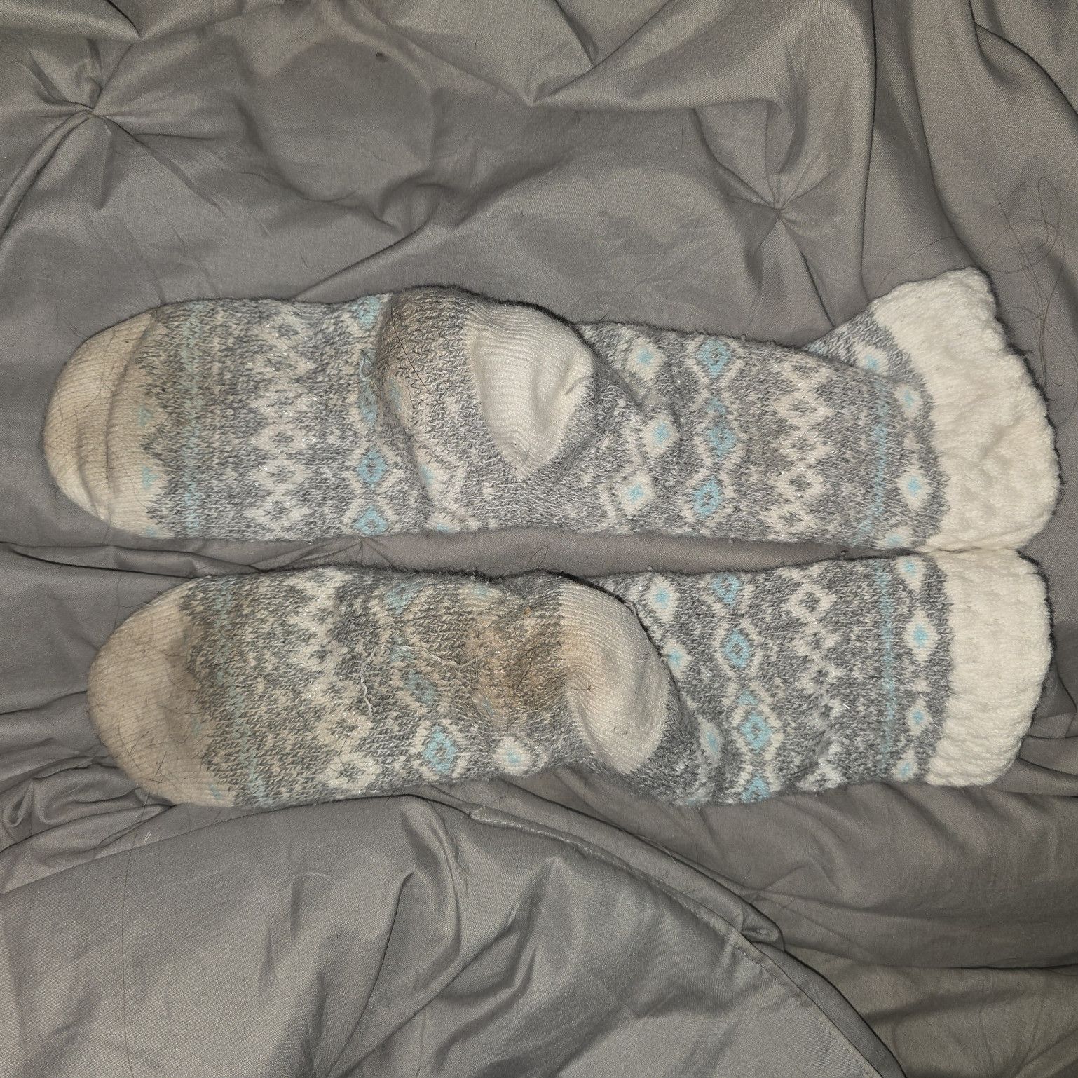 Well worn house slipper socks